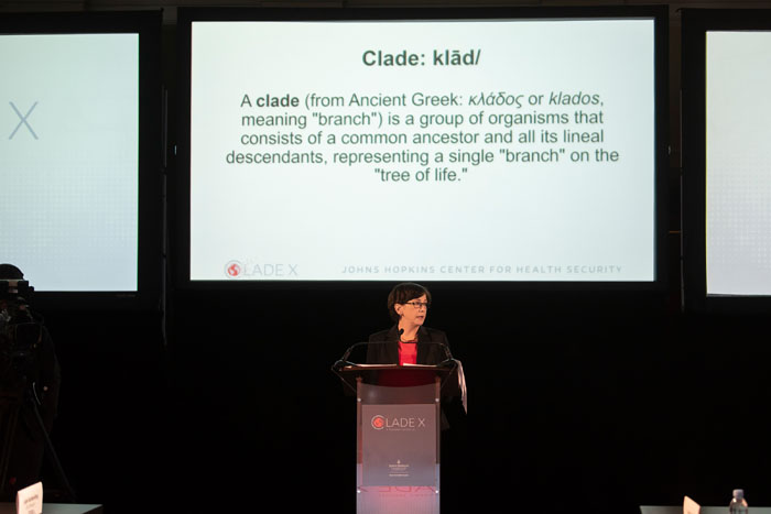 Anita Cicero, JD, welcoming the audience at Clade X on May 15, 2018 in Washington, DC.
