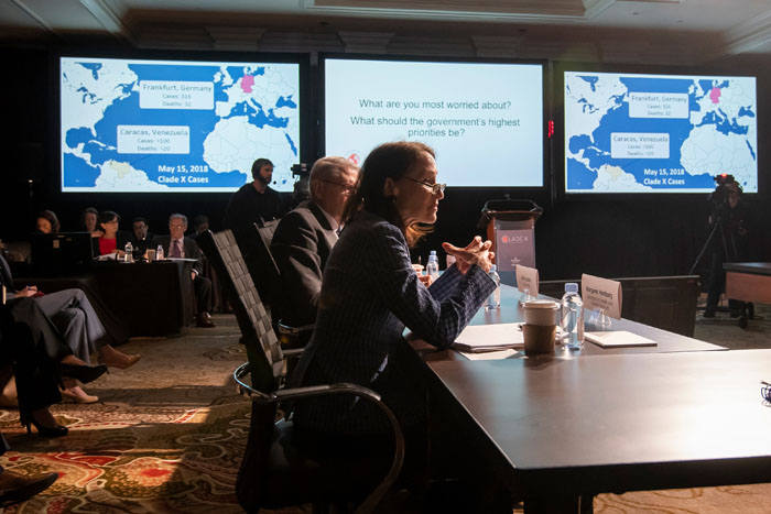 Secretary of Health and Human Services, played by Margaret Hamburg, speaking at Clade X on May 15, 2018 in Washington, DC.