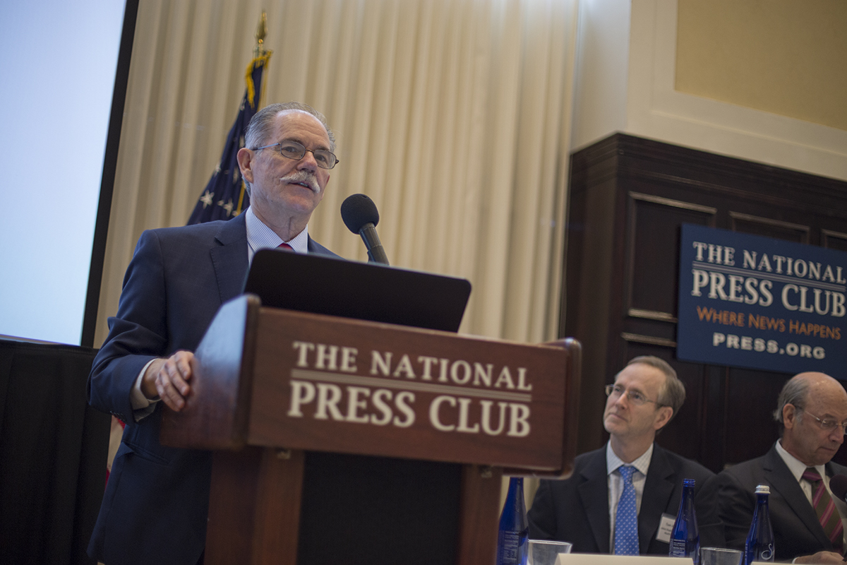 Eric Toner, MD, addresses a crowd at the National Press Club
